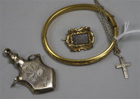 A Victorian mourning brooch, a bangle, scent flask and cross pendant.